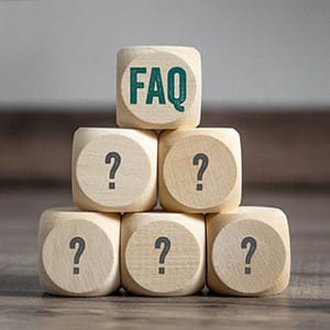F A Q blocks representing common dental implant questions in Lincoln