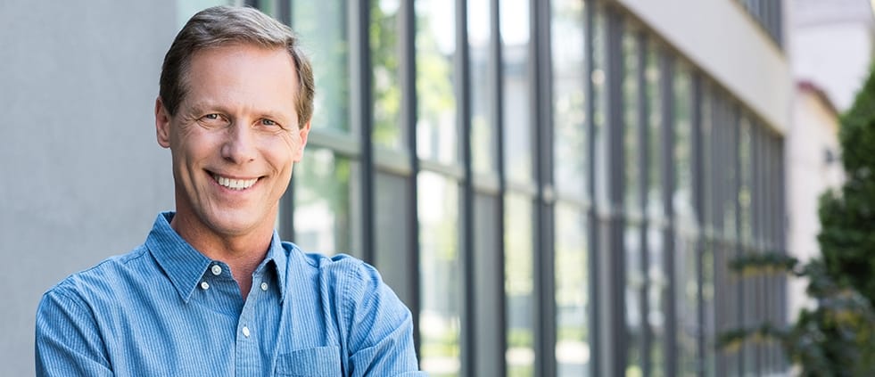 Man with healthy smile outdoors