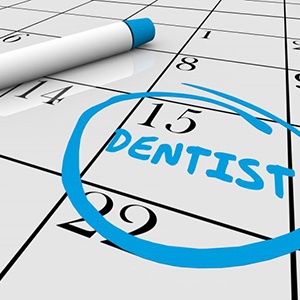 The date of a dental appointment circled on a calendar