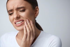 Woman with tooth pain.