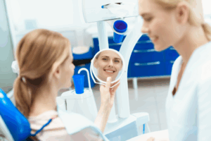 a patient chatting with their cosmetic dentist